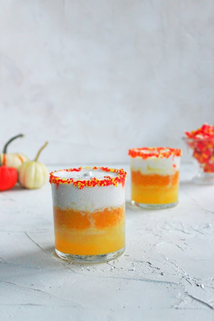 Two glasses of tropical candy corn cocktail