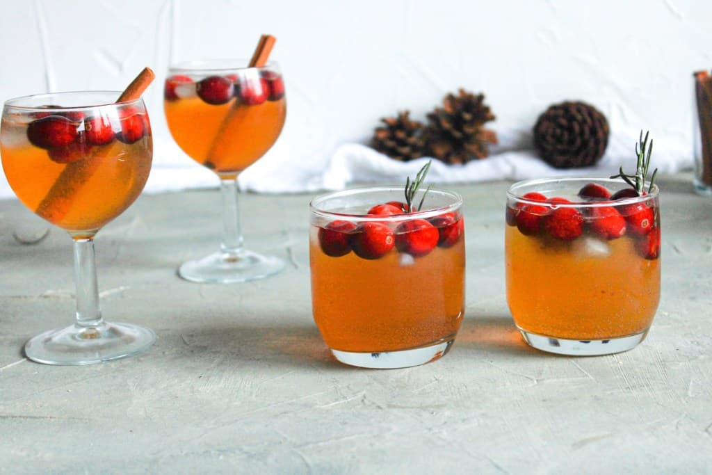 Four glasses of Cranberry Vanilla Chai Sangria