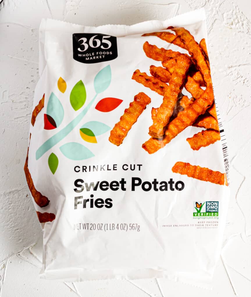 Bag of Frozen Sweet Potato Fries (not open) on a white surface