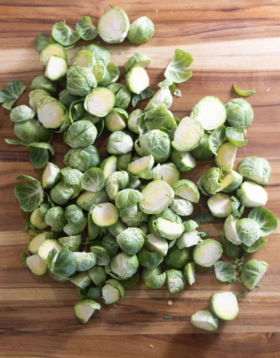 Brussel sprouts cut on a cutting board 