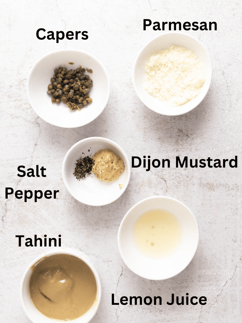 Ingredients for Tahini Caesar dressing  all in separate bowls