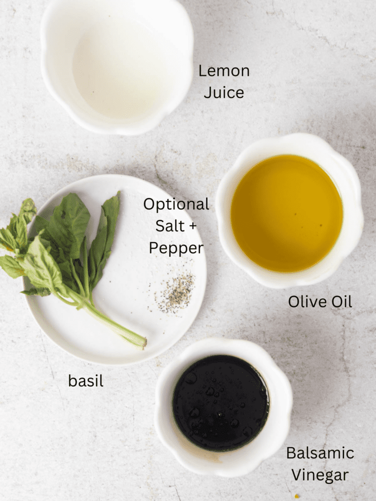 All ingredients for basil balsamic vinaigrette in individual bowls with labels 