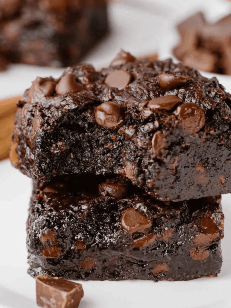 paleo brownies very up close showing inside in a stacl