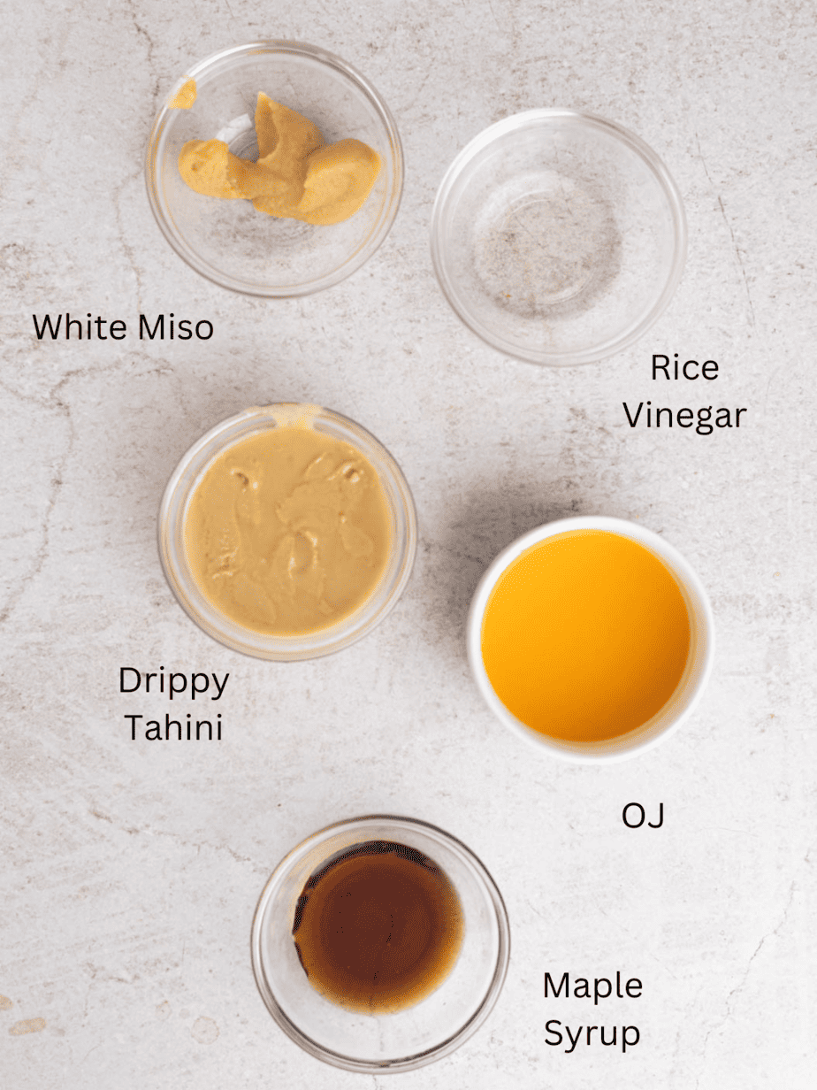 miso tahini dressing ingredients with text labels IDing what they are